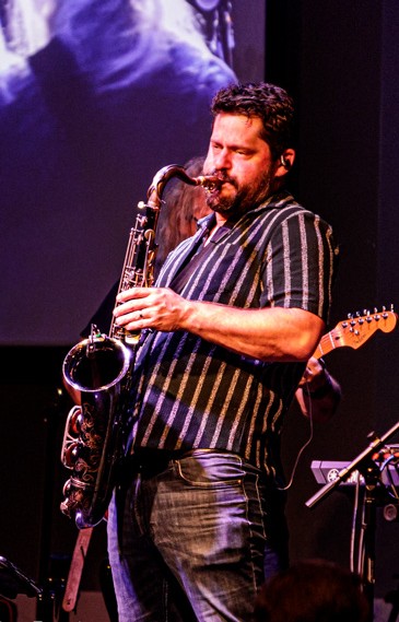 Doug Norton performing live on saxophone